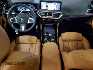 2025 BMW X4 xDrive30i z VIN 5UX33DT09S9Z17216, wystawiony jako Copart lot #55650105 z przebiegiem 1 214 mil mil oraz Szkoda całkowita • Salvage title. Historia ofert i sprzedaży dostępna na DreamBid. Obrazek 8.