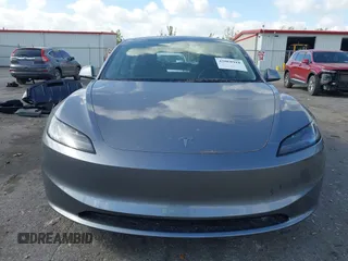 2025 Tesla Model 3 Long Range z VIN 5YJ3E1EA7SF892239, wystawiony jako IAAI lot #42068918 z przebiegiem 17 mil mil oraz . Historia ofert i sprzedaży dostępna na DreamBid. Obrazek 13.