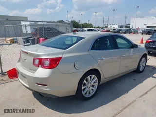 2014 Chevrolet Malibu LTZ with VIN 1G11H5SL2EF258468, listed as a IAAI auction lot 40360511 with 66,653 mi miles. Bid and sale history available at carsss.com. Image 4.