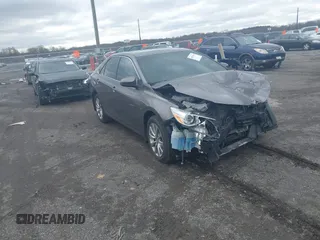 2015 Toyota Camry XLE with VIN 4T1BF1FKXFU936775, listed as a IAAI auction lot 41807486 with 97,148 mi miles and . Bid and sale history available at DreamBid. Image 1.