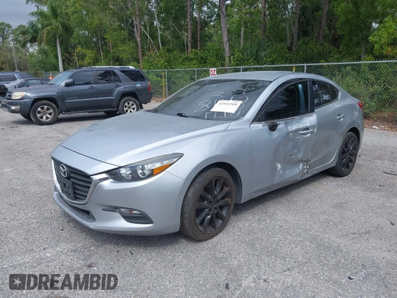 2017 Mazda 3 Touring with VIN 3MZBN1V76HM108148, listed as a IAAI auction lot 41911568 with 194,363 mi miles and . Bid and sale history available at DreamBid. Image 2.