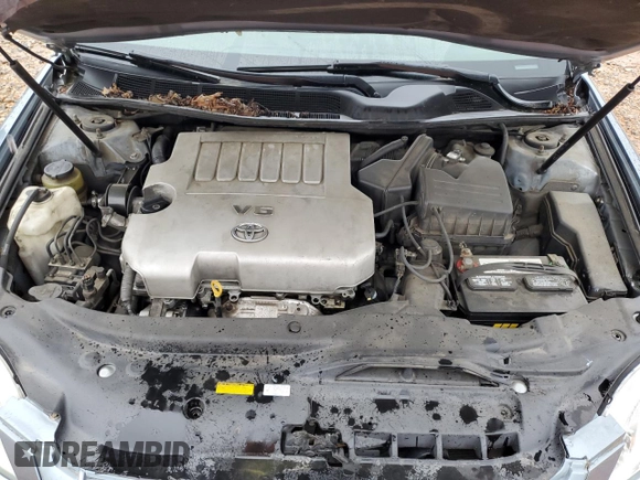 2005 Toyota Avalon XL z VIN 4T1BK36B65U041287, wystawiony jako Copart lot #56566535 z przebiegiem 223 562 mil mil oraz Szkoda całkowita • Salvage title. Historia ofert i sprzedaży dostępna na DreamBid. Obrazek 11.