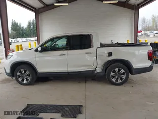 2017 Honda Ridgeline RTL-E with VIN 5FPYK3F7XHB030551, listed as a IAAI auction lot 41903844 with 153,594 mi miles. Bid and sale history available at carsss.com. Image 14.