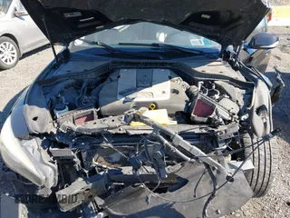 2014 Infiniti Q50 Premium with VIN JN1BV7AR0EM689783, listed as a IAAI auction lot 41661020 with 124,762 mi miles. Bid and sale history available at carsss.com. Image 10.