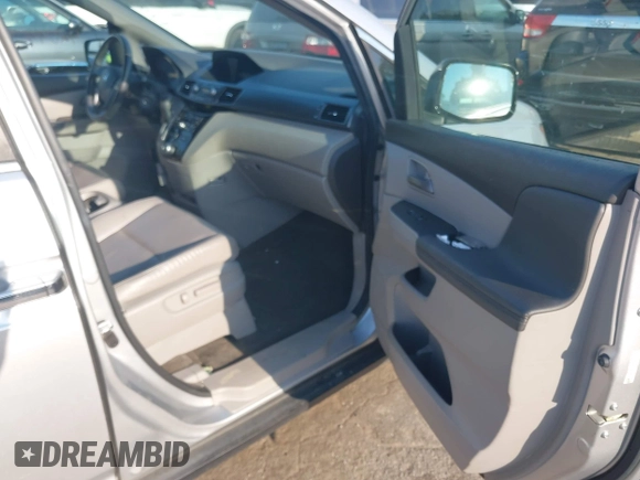 2013 Honda Odyssey EX-L with VIN 5FNRL5H6XDB084016, listed as a IAAI auction lot 42044300 with 156,296 mi miles and . Bid and sale history available at carsss.com. Image 5.