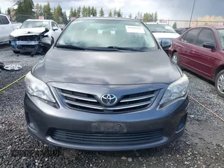 2013 Toyota Corolla L with VIN 5YFBU4EE8DP203741, listed as a IAAI auction lot 41943422 with 148,803 mi miles and . Bid and sale history available at DreamBid. Image 12.
