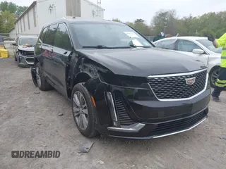 2022 Cadillac XT6 Premium Luxury z VIN 1GYKPDRS5NZ149971, wystawiony jako IAAI lot #42259140 z przebiegiem 51 704 mil mil oraz . Historia ofert i sprzedaży dostępna na DreamBid. Obrazek 1.