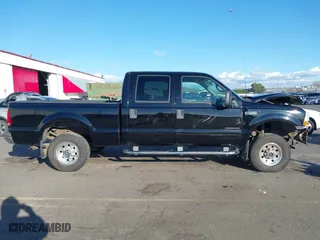 2002 Ford Super Duty F-250 XL with VIN 1FTNW21F22EB74368, listed as a IAAI auction lot 41636544 with 164,604 mi miles. Bid and sale history available at carsss.com. Image 14.