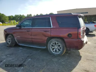 2017 GMC Yukon SLT with VIN 1GKS1BKC9HR362459, listed as a Copart auction lot 68303984 with 136,633 mi miles and Salvage Title. Bid and sale history available at carsss.com. Image 2.
