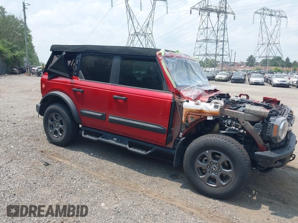 2023 Ford Bronco z VIN 1FMDE5BH8PLB24394, wystawiony jako IAAI lot #42449638 z przebiegiem 96 046 mil mil oraz . Historia ofert i sprzedaży dostępna na DreamBid. Obrazek 1.