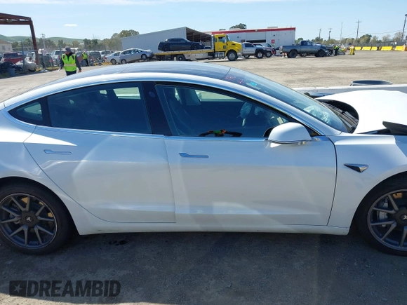 2020 Tesla Model 3 Long Range with VIN 5YJ3E1EB4LF619754, listed as a IAAI auction lot 41920422 with 82,430 mi miles and . Bid and sale history available at DreamBid. Image 12.