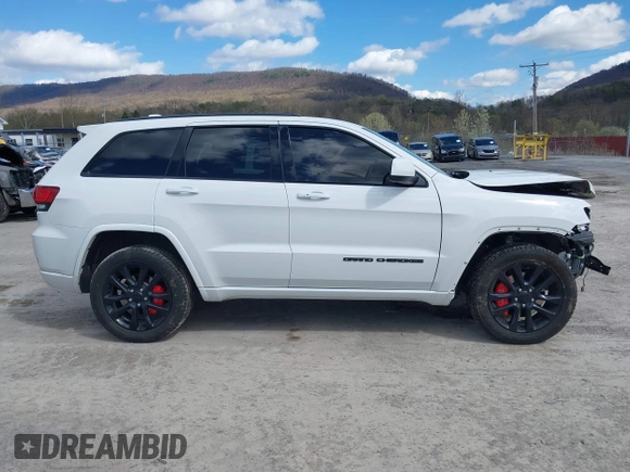 2021 Jeep Grand Cherokee Laredo E with VIN 1C4RJFAG6MC678713, listed as a IAAI auction lot 42015949 with 54,224 mi miles and . Bid and sale history available at DreamBid. Image 14.