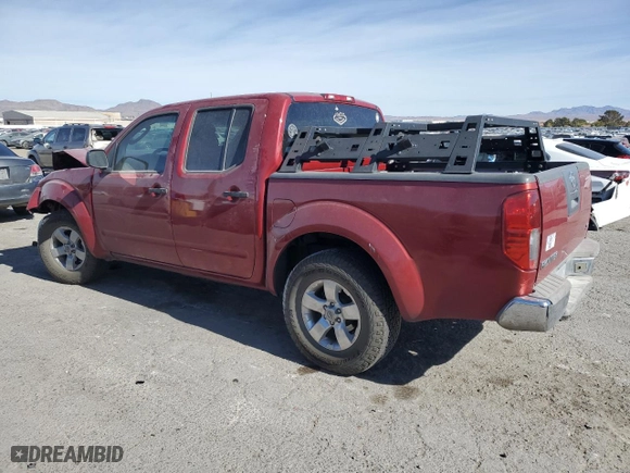 2009 Nissan Frontier SE with VIN 1N6AD07U29C424080, listed as a Copart auction lot 80589814 with 164,011 mi miles and Salvage Title. Bid and sale history available at carsss.com. Image 2.