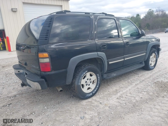 2004 Chevrolet Tahoe LT with VIN 1GNEC13Z74J314927, listed as a IAAI auction lot 41231288 with 195,809 mi miles. Bid and sale history available at carsss.com. Image 4.