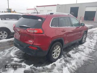 2014 Jeep Cherokee Latitude with VIN 1C4PJMCB8EW166853, listed as a IAAI auction lot 41579386 with 251,683 mi miles and . Bid and sale history available at DreamBid. Image 4.