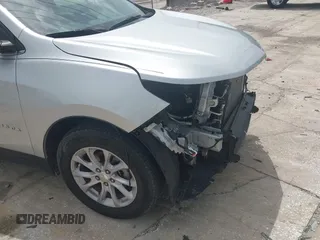 2021 Chevrolet Equinox LT z VIN 3GNAXKEV0MS165682, wystawiony jako IAAI lot #42419436 z przebiegiem 42 199 mil mil oraz . Historia ofert i sprzedaży dostępna na DreamBid. Obrazek 18.