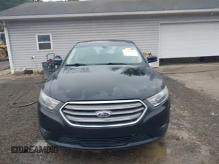 2013 Ford Taurus SEL with VIN 1FAHP2E83DG107913, listed as a IAAI auction lot 42007575 with 147,240 mi miles. Bid and sale history available at carsss.com. Image 13.