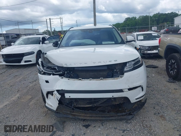 2020 Land Rover Range Rover Velar S z VIN SALYB2EX2LA256971, wystawiony jako IAAI lot #42525724 z przebiegiem 76 802 mil mil oraz . Historia ofert i sprzedaży dostępna na DreamBid. Obrazek 12.