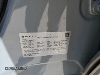 2022 Rivian R1T Adventure z VIN 7FCTGAAAXNN014983, wystawiony jako Copart lot #48987605 z przebiegiem Nie podano mil oraz Szkoda całkowita • Salvage title. Historia ofert i sprzedaży dostępna na DreamBid. Obrazek 12.