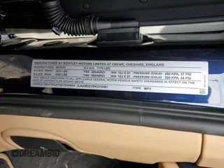 2022 Bentley Bentayga V8 z VIN SJAAM2ZV5NC016981, wystawiony jako Copart lot #43359514 z przebiegiem 8814 mil mil oraz . Historia ofert i sprzedaży dostępna na DreamBid. Obrazek 12.