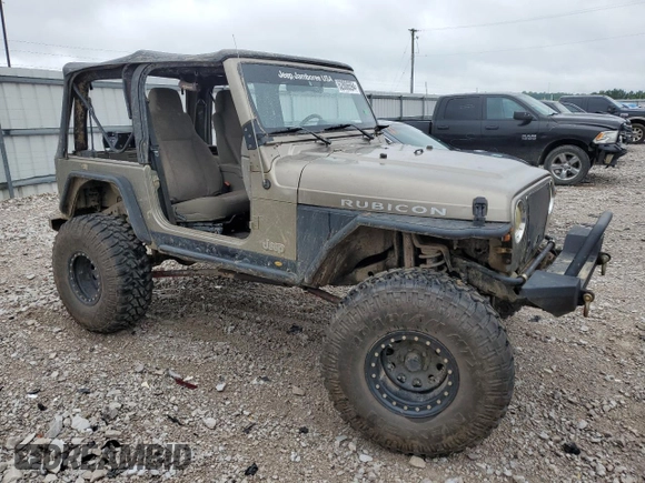 2004 Jeep Wrangler Rubicon with VIN 1J4FA69S94P774219, listed as a Copart auction lot 62806594 with 121,819 mi miles and Salvage Title. Bid and sale history available at carsss.com. Image 4.