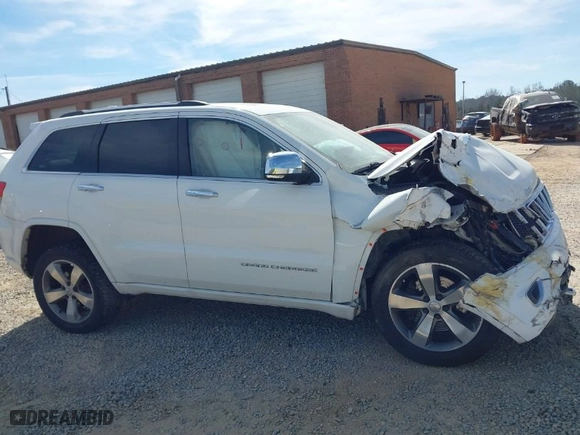 2014 Jeep Grand Cherokee Overland with VIN 1C4RJFCT6EC126897, listed as a IAAI auction lot 41826773 with 115,251 mi miles. Bid and sale history available at carsss.com. Image 13.