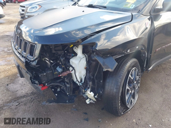 2019 Jeep Compass Trailhawk with VIN 3C4NJDDBXKT671364, listed as a IAAI auction lot 41655974 with 104,252 mi miles and . Bid and sale history available at carsss.com. Image 6.