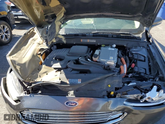 2016 Ford Fusion SE Hybrid with VIN 3FA6P0LU3GR307666, listed as a Copart auction lot 57444365 with 127,786 mi miles and Salvage title. Bid and sale history available at DreamBid. Image 11.