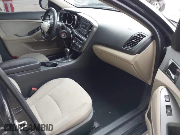 2014 Kia Optima LX with VIN 5XXGM4A7XEG280084, listed as a IAAI auction lot 42063263 with 168,052 mi miles. Bid and sale history available at carsss.com. Image 5.