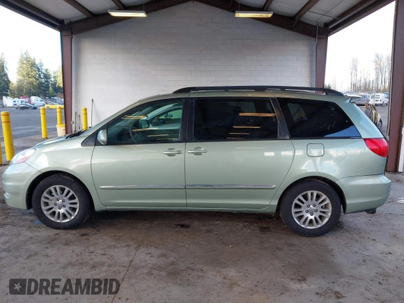 2009 Toyota Sienna XLE with VIN 5TDZK22C19S236509, listed as a IAAI auction lot 41250793 with 175,395 mi miles and . Bid and sale history available at DreamBid. Image 14.