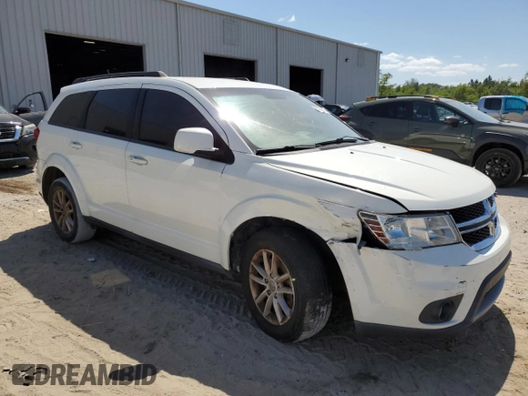 2017 Dodge Journey SXT with VIN 3C4PDCBG3HT591244, listed as a Copart auction lot 55197655 with 202,469 mi miles and Salvage Title. Bid and sale history available at DreamBid. Image 4.