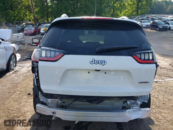 2019 Jeep Cherokee Latitude Plus z VIN 1C4PJLLBXKD308346, wystawiony jako IAAI lot #42146125 z przebiegiem 94 066 mil mil oraz . Historia ofert i sprzedaży dostępna na DreamBid. Obrazek 6.