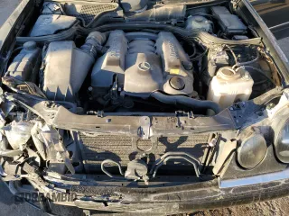 1999 Mercedes-Benz E-Class with VIN WDBJF82H9XX026911, listed as a Copart auction lot 48808835 with 205,953 mi miles and Salvage Title. Bid and sale history available at carsss.com. Image 12.