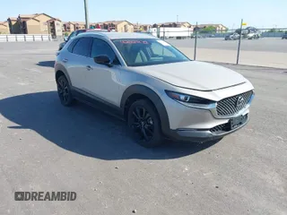 2024 Mazda CX-30 2.5 S Select Sport with VIN 3MVDMBBM4RM689518, listed as a IAAI auction lot 42021872 with 5,041 mi miles. Bid and sale history available at carsss.com. Image 1.