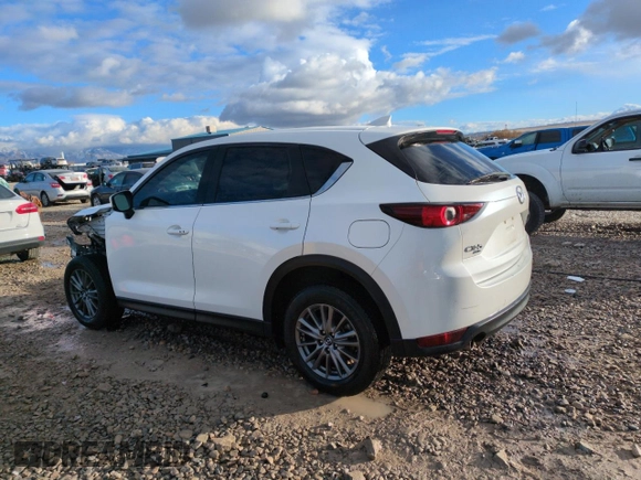 2021 Mazda CX-5 Touring with VIN JM3KFBCM0M0355894, listed as a Copart auction lot 83593464 with 80,703 mi miles and Salvage Title. Bid and sale history available at carsss.com. Image 2.