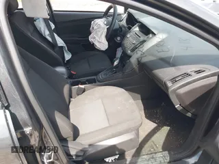 2017 Ford Focus SE with VIN 1FADP3F20HL335881, listed as a IAAI auction lot 42074241 with 127,741 mi miles. Bid and sale history available at carsss.com. Image 5.