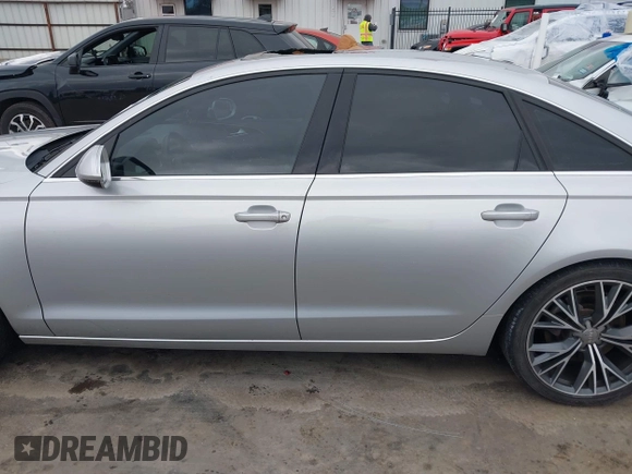 2015 Audi A6 Premium Plus z VIN WAUGFAFC8FN032627, wystawiony jako IAAI lot #41270302 z przebiegiem 82 104 mil mil oraz . Historia ofert i sprzedaży dostępna na DreamBid. Obrazek 14.