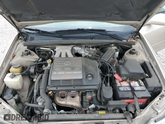 2003 Toyota Avalon XL z VIN 4T1BF28BX3U321934, wystawiony jako Copart lot #59497525 z przebiegiem 107 405 mil mil oraz Szkoda całkowita • Salvage title. Historia ofert i sprzedaży dostępna na DreamBid. Obrazek 11.