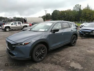 2023 Mazda CX-5 2.5 S Carbon Edition with VIN JM3KFBCM1P0209900, listed as a IAAI auction lot 37342913 with 3,853 mi miles. Bid and sale history available at carsss.com. Image 17.