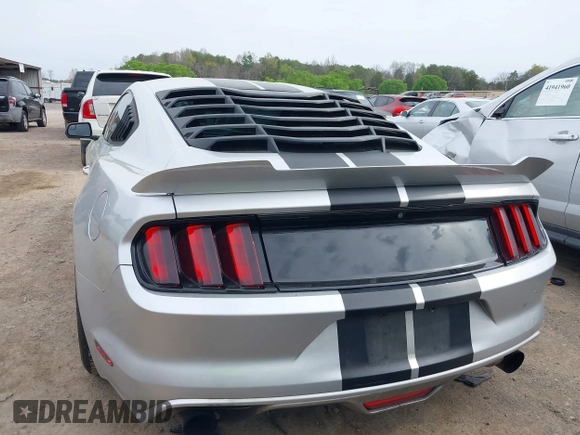 2015 Ford Mustang EcoBoost with VIN 1FA6P8TH9F5373917, listed as a IAAI auction lot 41932118 with 70,541 mi miles and . Bid and sale history available at carsss.com. Image 16.