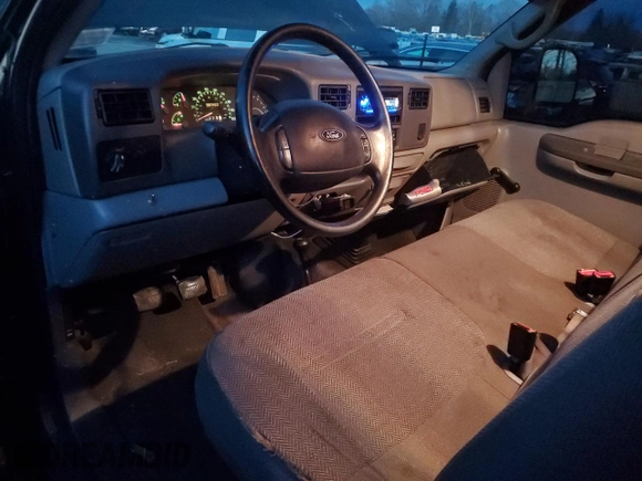 1999 Ford F-350 XL with VIN 1FTSF31L1XEA83209, listed as a Copart auction lot 81034374 with 151,361 mi miles and Salvage Title. Bid and sale history available at DreamBid. Image 8.
