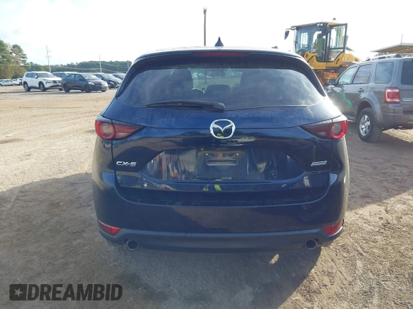 2018 Mazda CX-5 Touring z VIN JM3KFACM0J1389057, wystawiony jako IAAI lot #40922679 z przebiegiem 140 026 mil mil oraz . Historia ofert i sprzedaży dostępna na DreamBid. Obrazek 17.