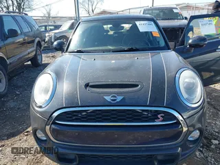 2015 MINI Hardtop 4 Door S with VIN WMWXU3C52F2B56517, listed as a IAAI auction lot 41437491 with 111,916 mi miles and . Bid and sale history available at DreamBid. Image 6.