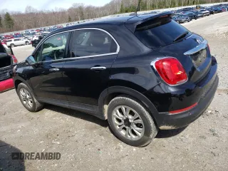 2016 FIAT 500X Lounge z VIN ZFBCFYDT4GP395562, wystawiony jako Copart lot #52273235 z przebiegiem 150 036 mil mil oraz Szkody całkowita. Historia ofert i sprzedaży dostępna na DreamBid. Obrazek 2.