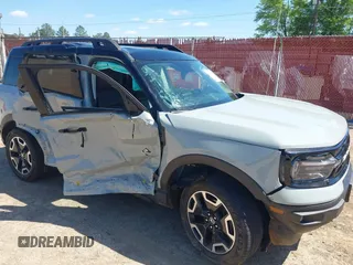 2022 Ford Bronco Sport Outer Banks z VIN 3FMCR9C67NRD82022, wystawiony jako IAAI lot #41968977 z przebiegiem 48 976 mil mil oraz . Historia ofert i sprzedaży dostępna na DreamBid. Obrazek 6.