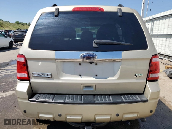 2010 Ford Escape Limited z VIN 1FMCU9EG5AKC49732, wystawiony jako Copart lot #61172415 z przebiegiem 148 796 mil mil oraz Szkoda całkowita • Salvage title. Historia ofert i sprzedaży dostępna na DreamBid. Obrazek 6.