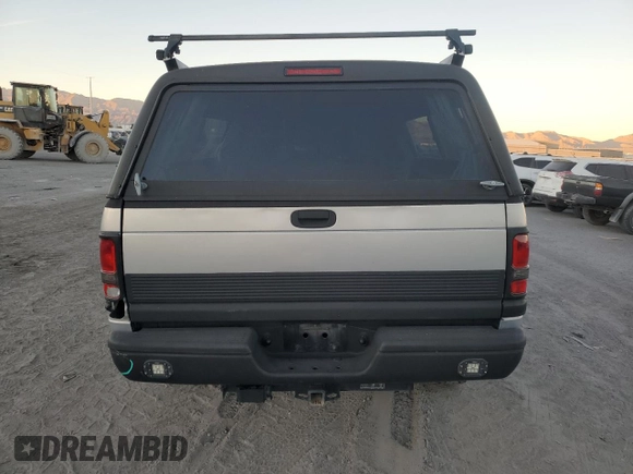2000 Dodge 2500 z VIN 1B7KF2369YJ144753, wystawiony jako Copart lot #80801414 z przebiegiem 173 413 mil mil oraz Szkoda całkowita • Salvage title. Historia ofert i sprzedaży dostępna na DreamBid. Obrazek 6.