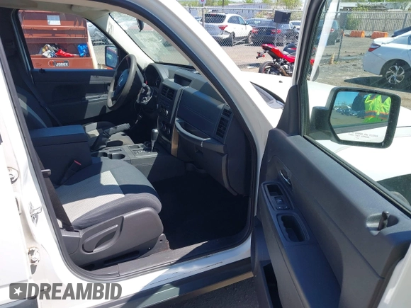 2009 Jeep Liberty Sport with VIN 1J8GN28K89W536182, listed as a IAAI auction lot 42086597 with 161,928 mi miles. Bid and sale history available at carsss.com. Image 5.