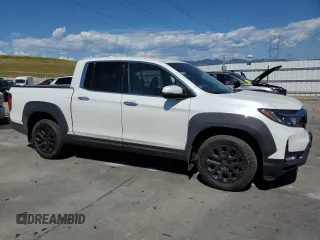 2023 Honda Ridgeline RTL-E with VIN 5FPYK3F76PB011963, listed as a Copart auction lot 63079165 with 25,658 mi miles and Salvage title. Bid and sale history available at DreamBid. Image 4.