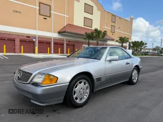 1994 Mercedes-Benz SL z VIN WDBFA63E0RF094472, wystawiony jako Copart lot #58923925 z przebiegiem 55 706 mil mil oraz Tytuł czysty. Historia ofert i sprzedaży dostępna na DreamBid. Obrazek 2.